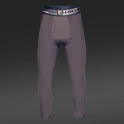 Graue Kompressionsleggings mit schwarz-weißem „Hillman“-Bund aus wärmender Merinowolle. Die Vorderansicht mit dunklem Farbverlauf betont die dezente Konturierung für eine perfekte anatomische Passform. Produkt: 2BL Merino Lange Unterhose – Merino Thermounterwäsche für die Jagd.