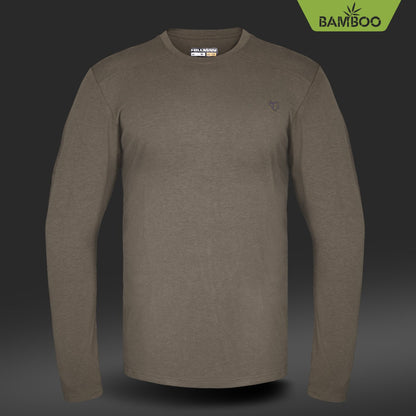 Das Hillman 1UL Langarmshirt Bambus für die Jagd präsentiert sich in Olivgrün mit langärmligem Rundhalsausschnitt. Es verfügt über ein dezentes Logo auf der Brust und ein umweltfreundliches Bambusetikett für natürliche antibakterielle Eigenschaften.